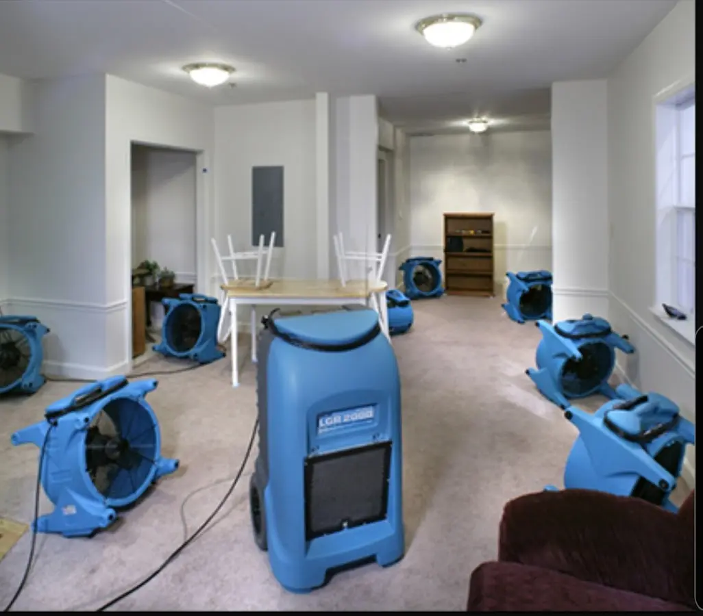 Air movers and dehumidifier setup for Water Damage Restoration in American Falls